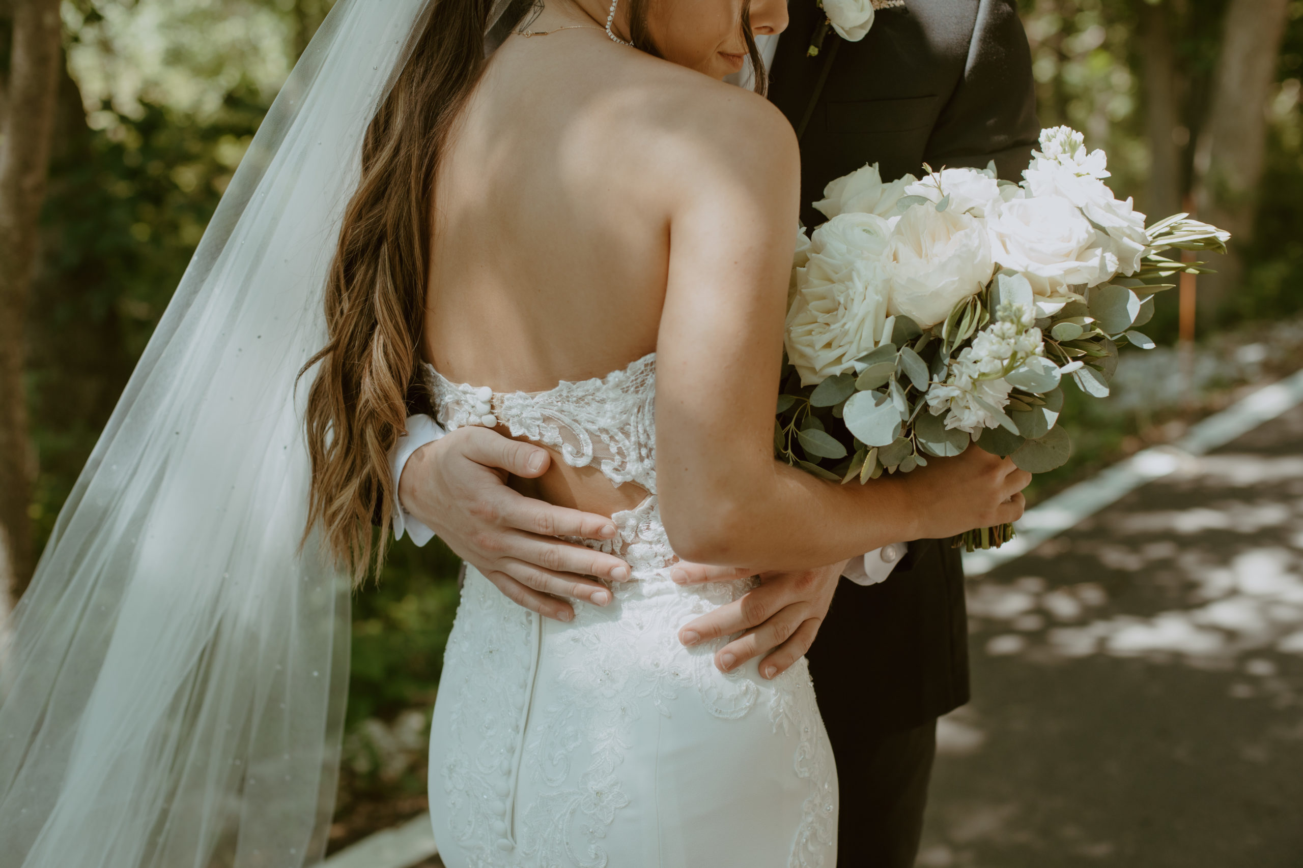 all-white-wedding-bouquet-bride-and-groom-portraits